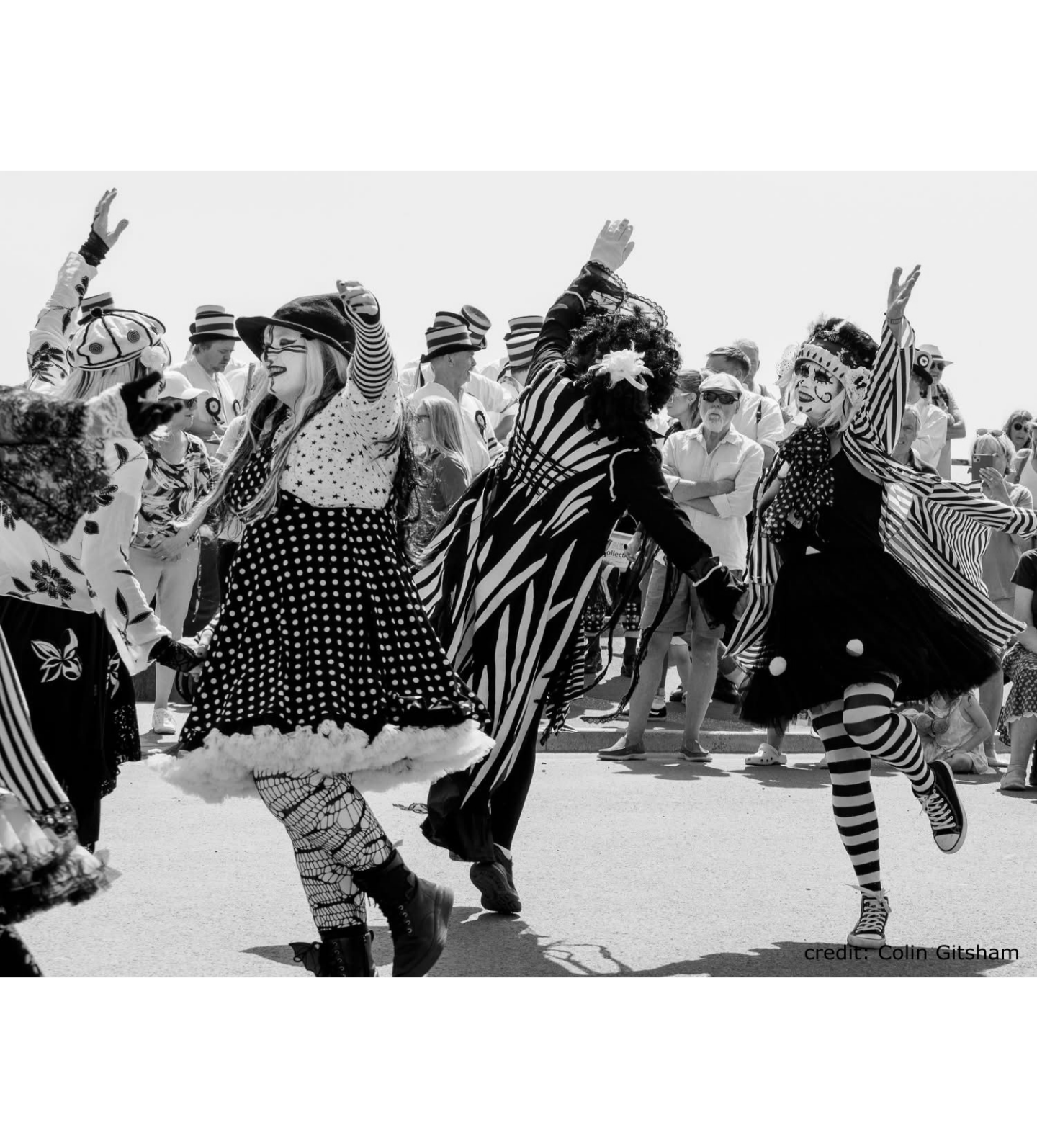 Four dancers performing at Sidmouth Folk Festival in 2025