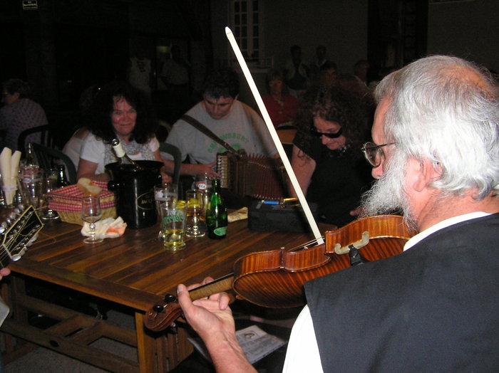 Music session in the evening at the covered market place. Fiddler is Jean Blanchard - also playing melodeon on pic 14