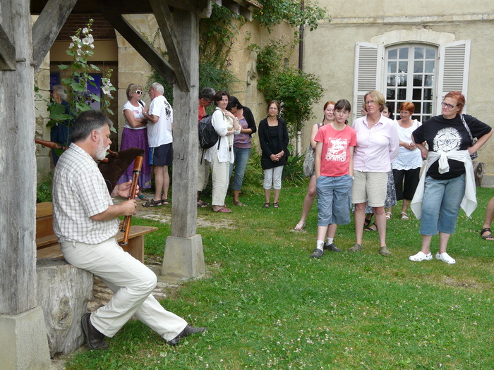 Chateau Le Plaix is the property of an other folk dance group, friends of Notre Berry. Mic (with the bagpipe) was also our tour guide of the Chateau, which is a museum of C.19 and early C.20 "paysan" life.
